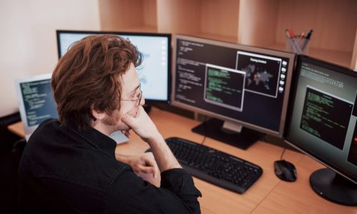 male-programmer-working-on-desktop-computer-with-many-monitors-at-office-in-software-develop-company.jpg male-programmer-working-on-desktop-computer-with-many-monitors-at-office-in-software-develop-company.jpg